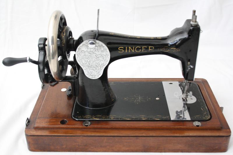 Restored Singer machine on a workshop table